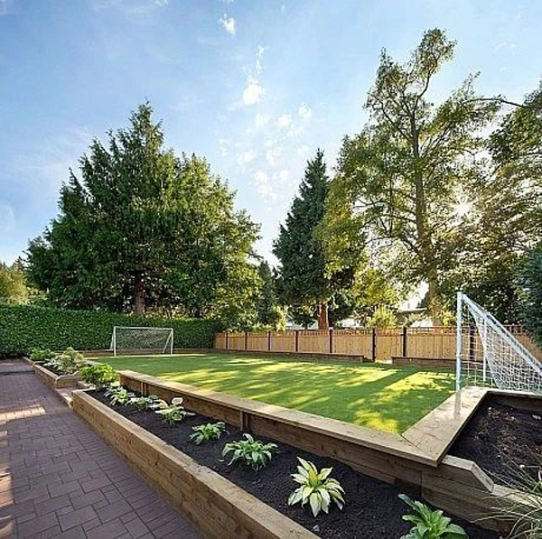 small-backyard-soccer-field-with-raised-garden