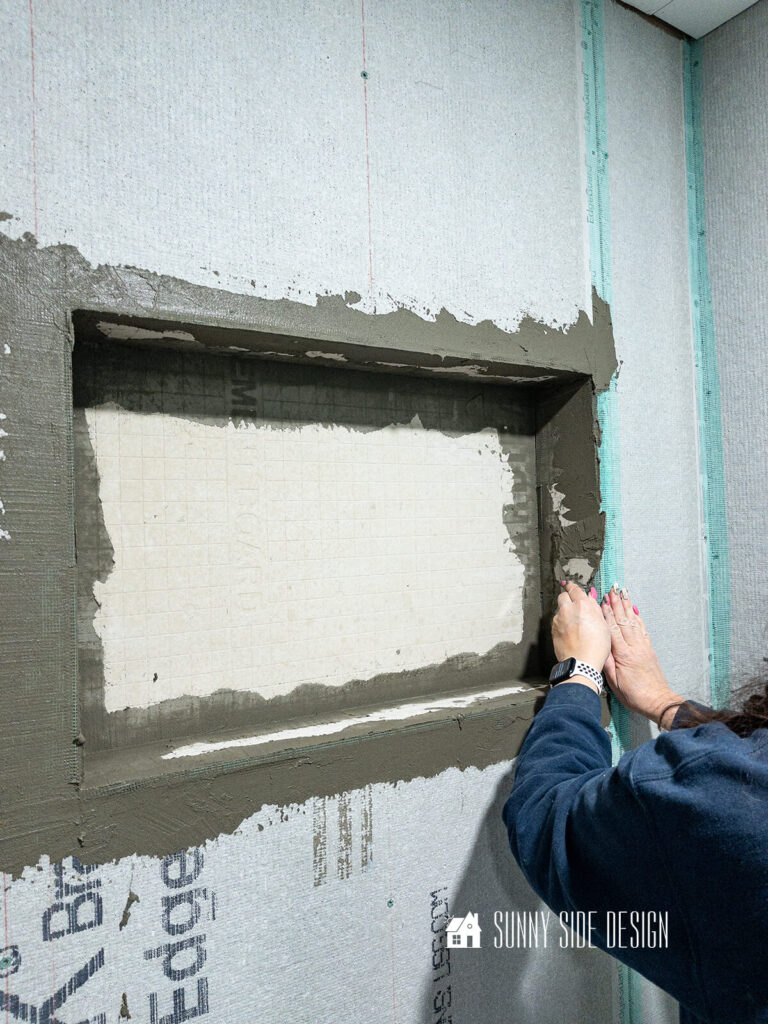 Mortar is applied to all of the cement board and mesh seams.