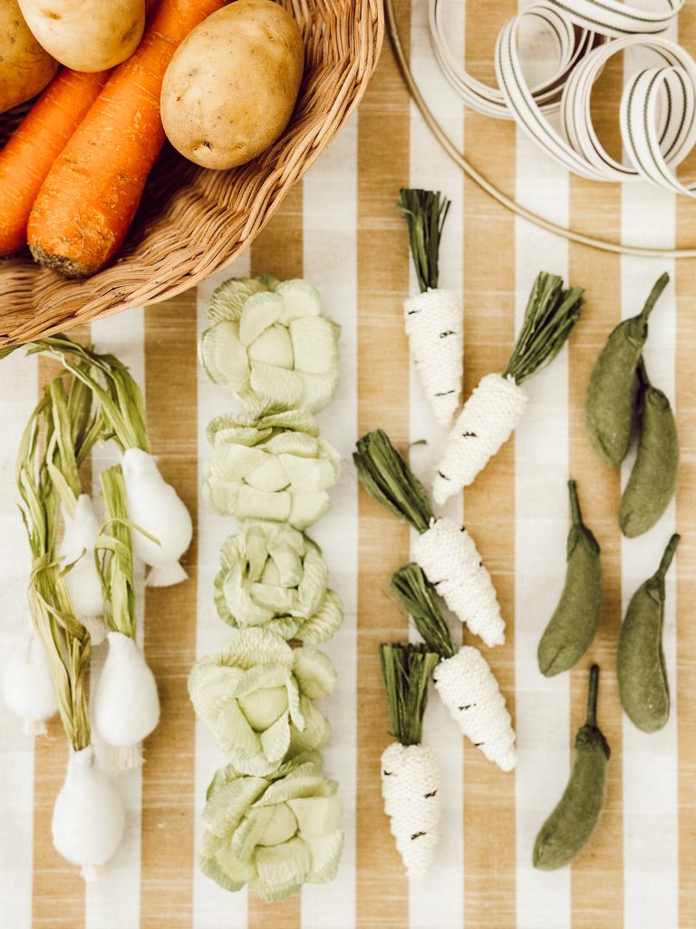 The supplies you'll need to craft a spring wreath DIY with felt vegetables.